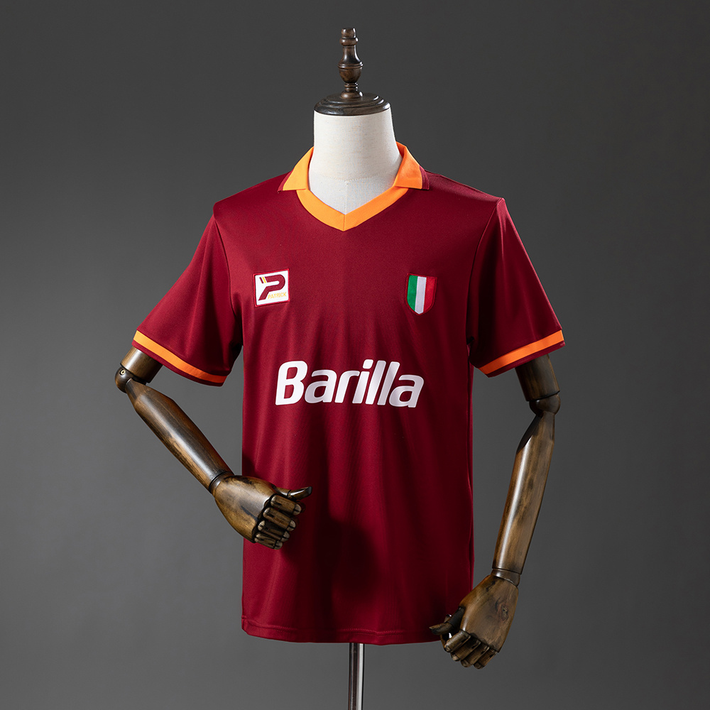 Mens Roma Retro Home Jersey 1983/84 Mens Roma Retro Home Jersey 1983/84 on mannequin showing carmine red body and Scudetto shield