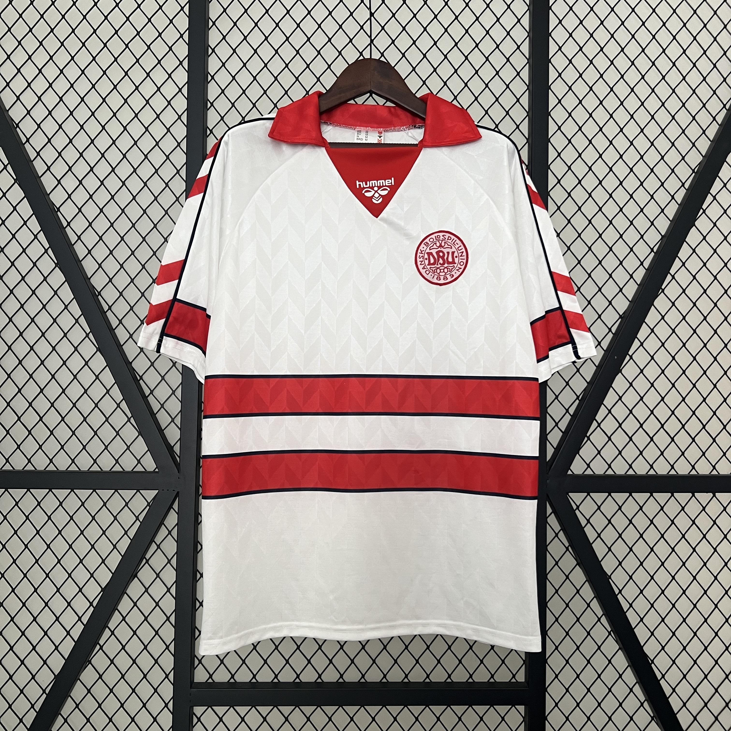 Mens Denmark Retro Away Jersey 1988 Mens Denmark Retro Away Jersey 1988 front view on hanger showing white body with twin red horizontal bands
