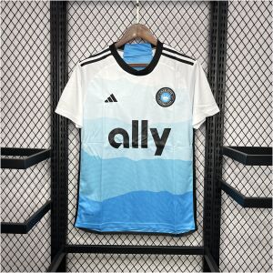 Mens Charlotte Home Jersey 2024/25 on hanger showing white-to-blue topographic wave gradient with ally logo