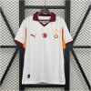 Mens Galatasaray Away Jersey 2025/26 on hanger showing white body with maroon polo collar and orange underarm panels