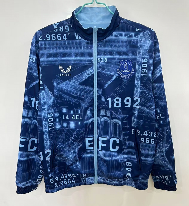 Mens Everton blue reversible Windbreaker 2025/26 Mens Everton blue reversible Windbreaker 2025/26 on hanger showing dark blue Goodison Park blueprint print and sky blue zipper