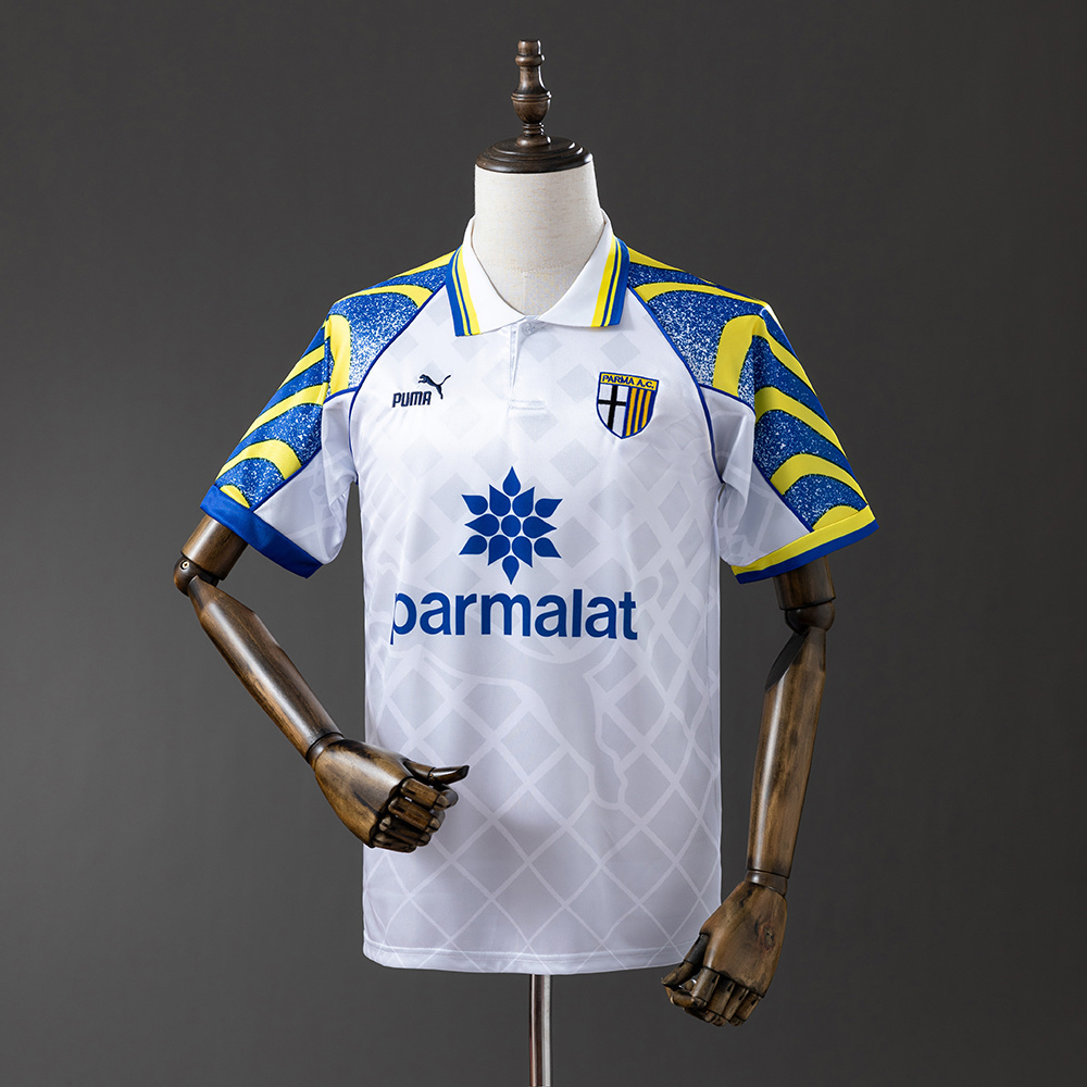 Mens Parma Retro Away Jersey 1995/96 Mens Parma Retro Away Jersey 1995/96 on hanger showing white body and blue paint-splatter flame sleeves