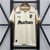 Mens Lens Third Jersey 2025/26 on hanger showing ecru cream body with gold polo collar and 120th anniversary crest