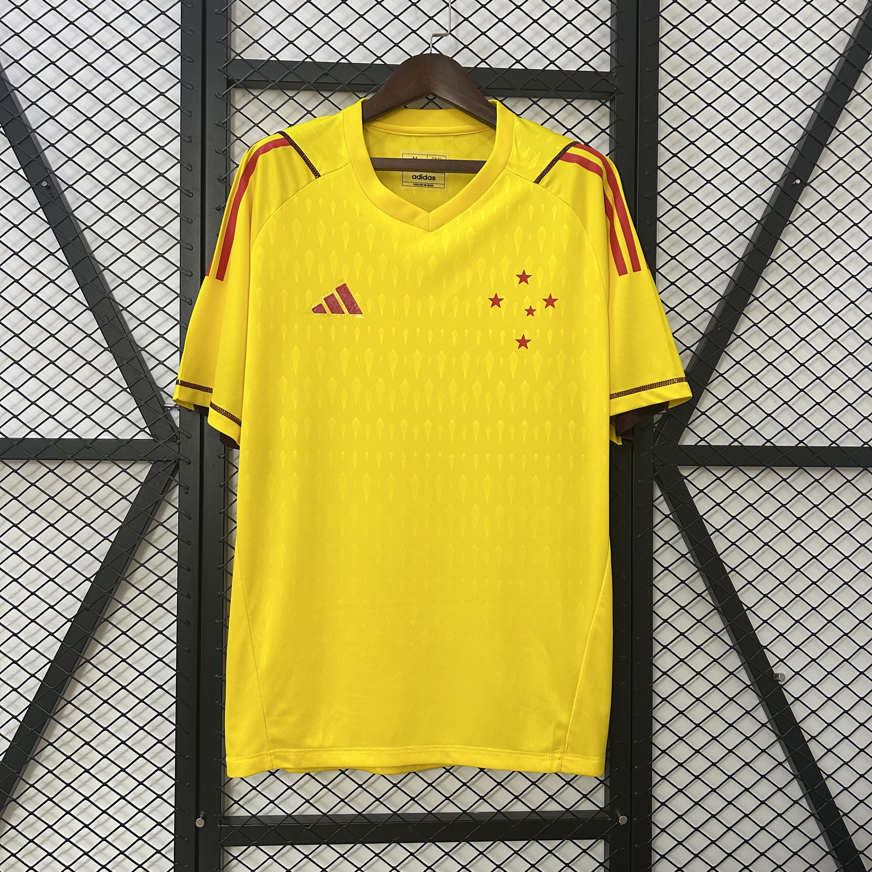 Mens Cruzeiro Limited Edition Yellow Goalkeeper Jersey 2024/25 Mens Cruzeiro Limited Edition Yellow Goalkeeper Jersey 2024/25 front view on display