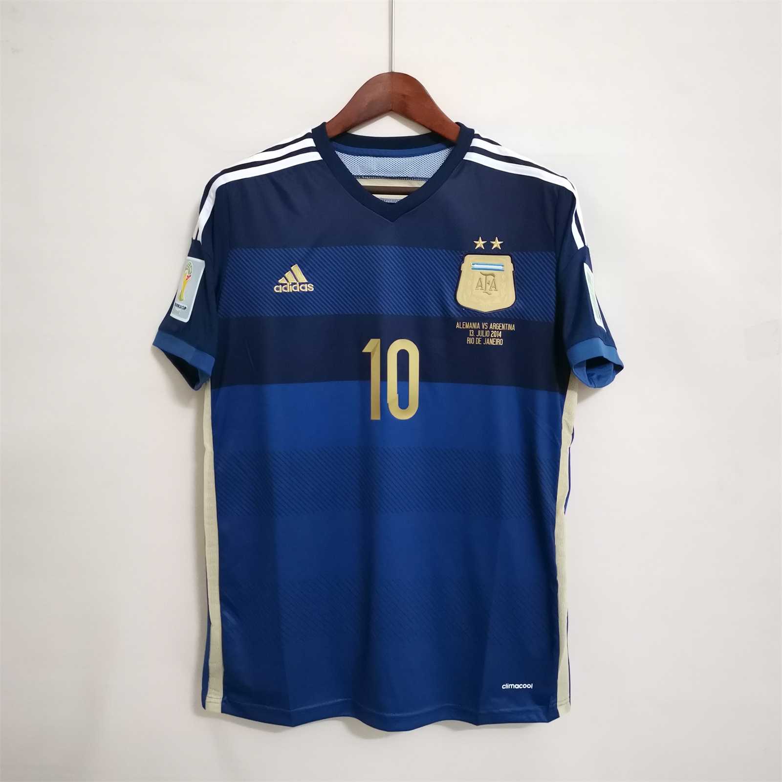 Mens World Cup Argentina Retro Away Jersey 2014 Mens World Cup Argentina Retro Away Jersey 2014 on hanger showing navy horizontal hoops and gold number 10