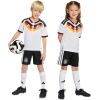 White kids Germany home shirt with black, red and gold chevron front view