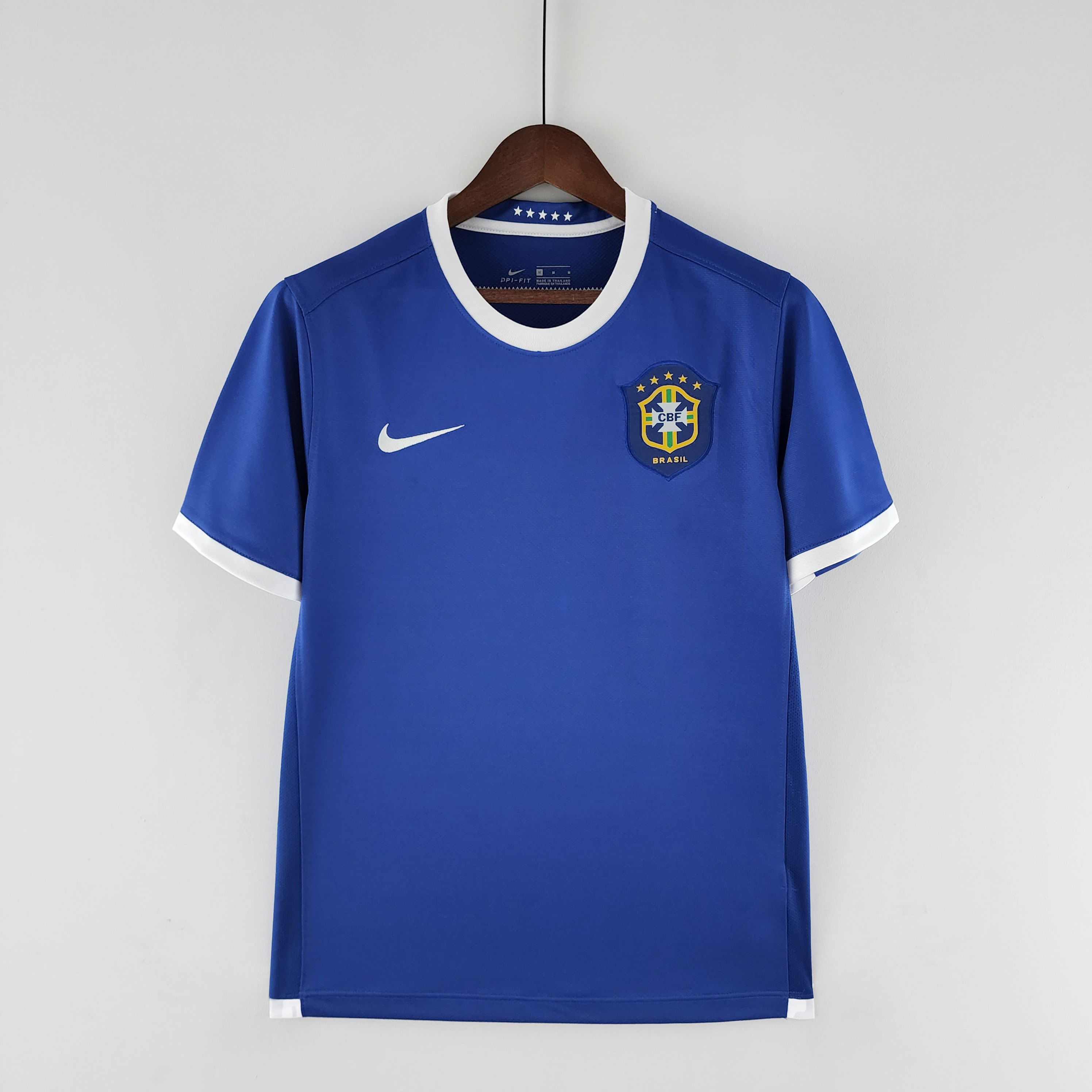 Mens World Cup Brazil Retro Away Jersey 2006 Mens World Cup Brazil Retro Away Jersey 2006 on hanger showing royal blue body with white collar and cuffs
