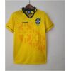 Mens Brazil yellow Retro Home Jersey 1993 on hanger showing watermarked crests and green polo collar