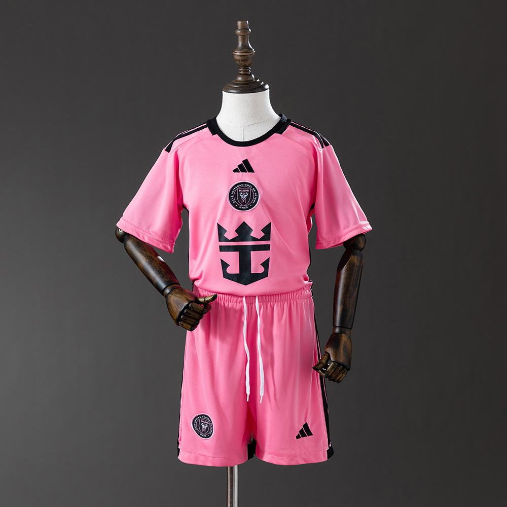 Kids Inter Miami Home Kit 2024/25 Kids Inter Miami Home Kit 2024/25 pink shirt and shorts set showing centered crest