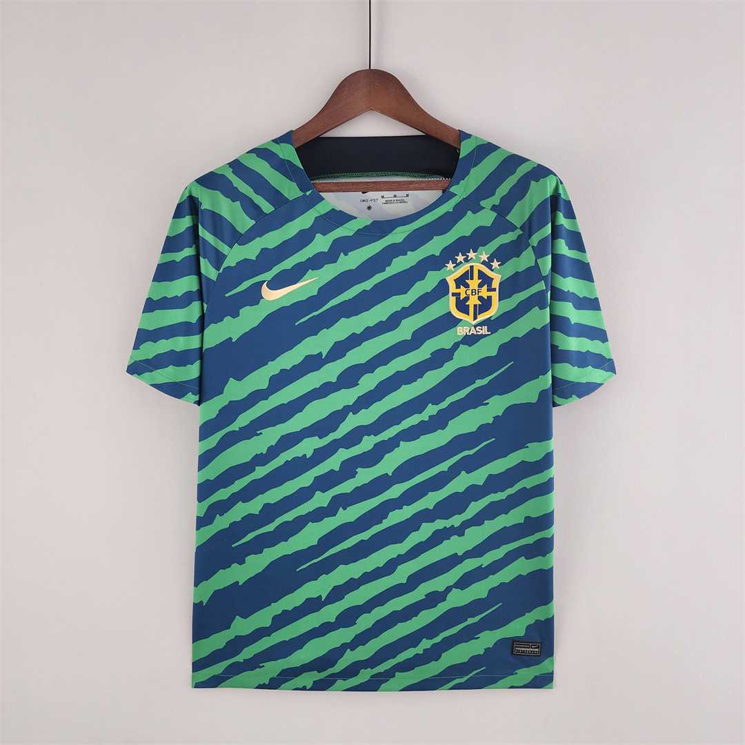 Mens World Cup Brazil green and blue Special Edition Jersey 2022 Mens World Cup Brazil green and blue Special Edition Jersey 2022 on hanger showing green and blue diagonal slashes