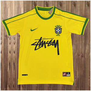 Mens World Cup Brazil Signed Edition Yellow Retro Home Jersey 1998 flat view showing yellow body and signature script