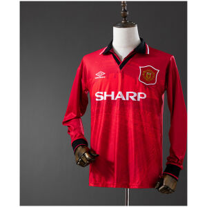 Mens Manchester United Retro Long Sleeve Home Jersey 1994/96 on mannequin showing red body with Old Trafford blueprint