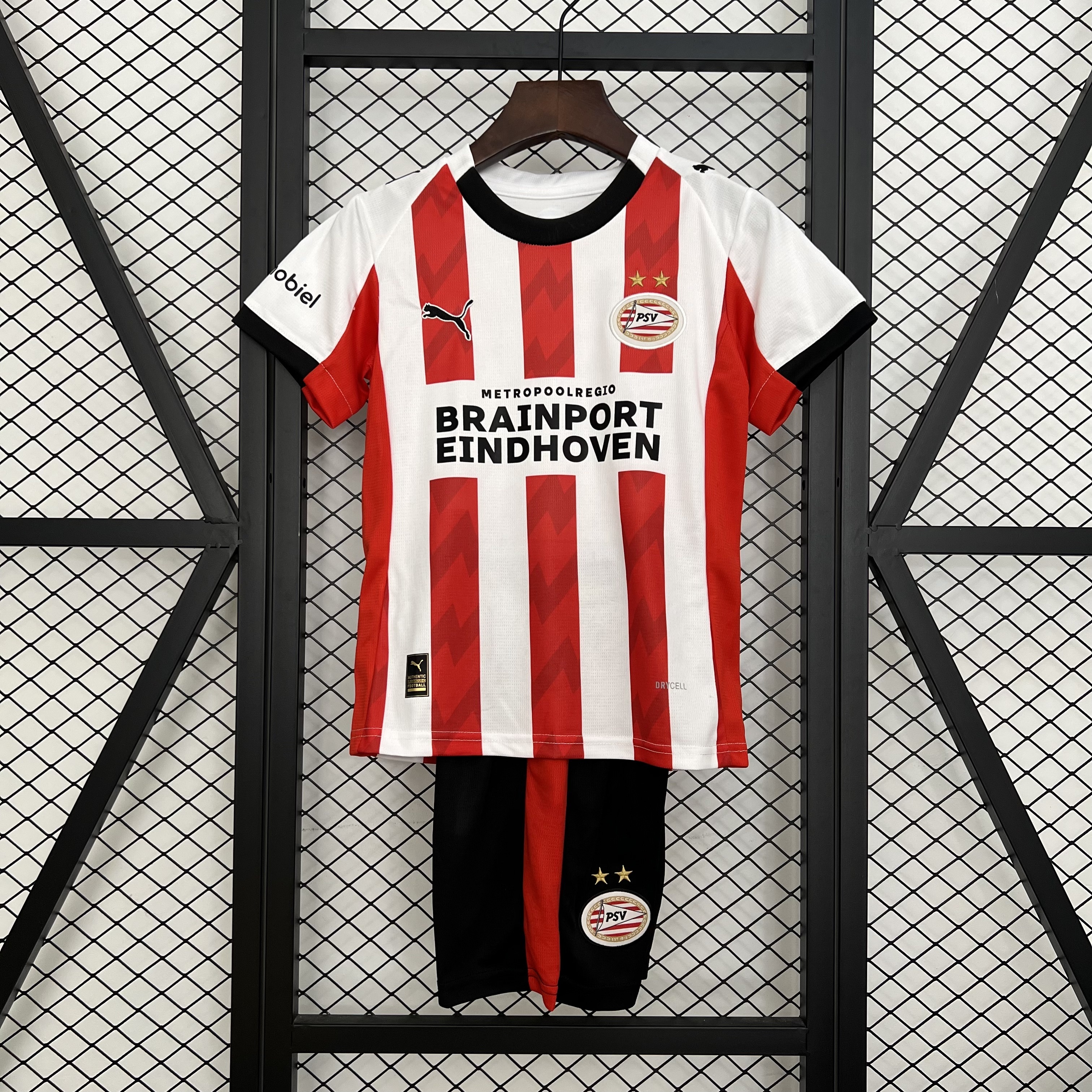 Kids PSV Eindhoven Home Kit 2025/26 Kids PSV Eindhoven Home Kit 2025/26 front view on display