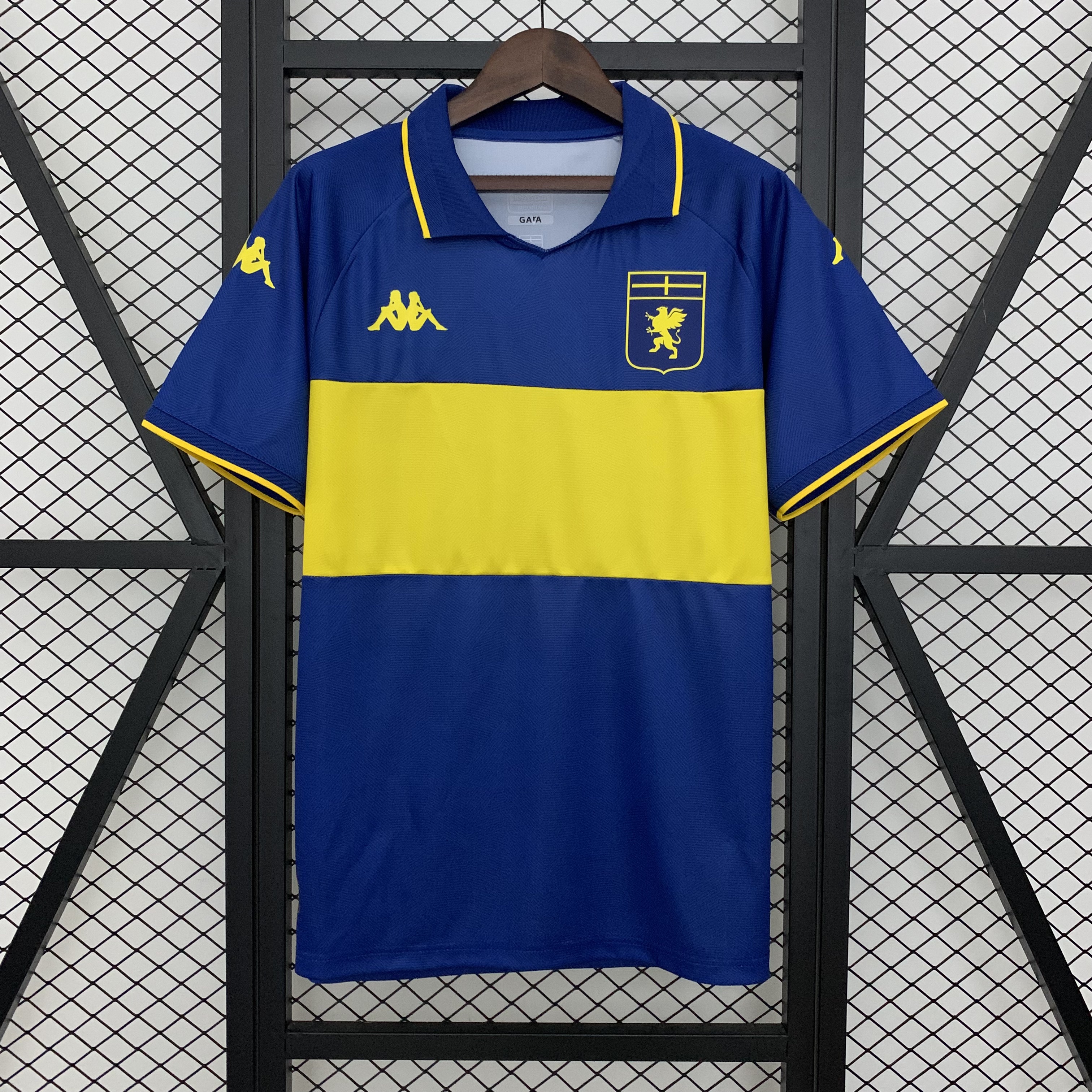 Mens Genoa Blue Special Edition Jersey 2025/26 Mens Genoa Blue Special Edition Jersey 2025/26 on hanger showing royal blue body with yellow horizontal band