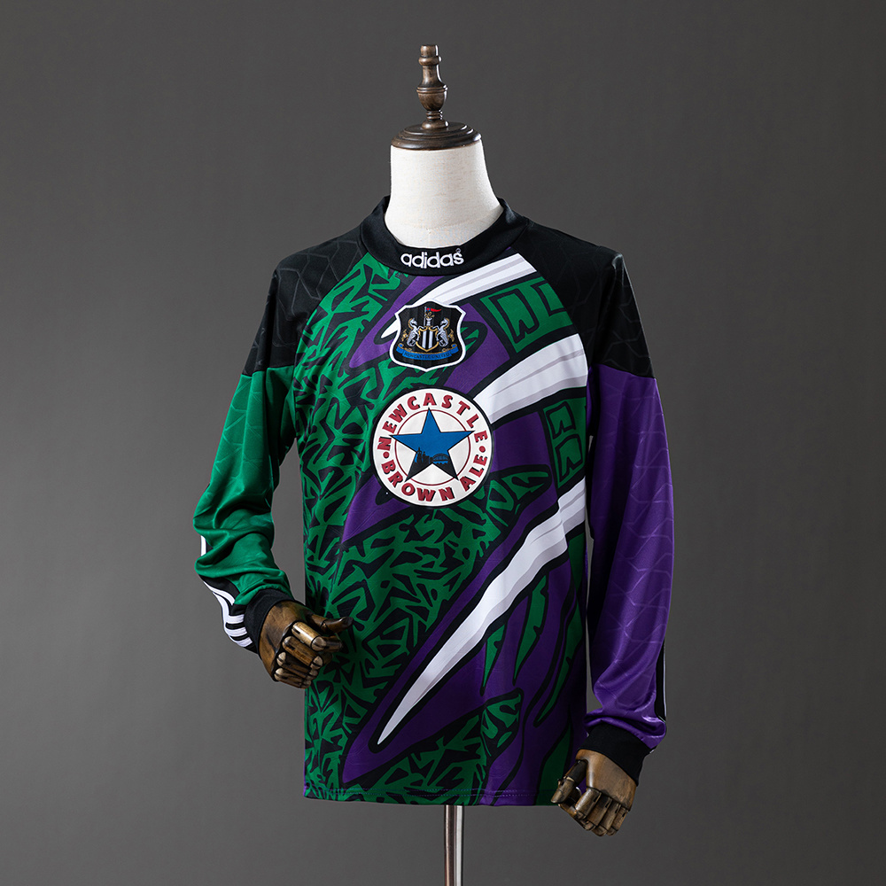 Mens Newcastle United Retro Long Sleeve Goalkeeper Jersey 1995/96 Mens Newcastle United Retro Long Sleeve Goalkeeper Jersey 1995/96 on mannequin showing purple and green fractal pattern
