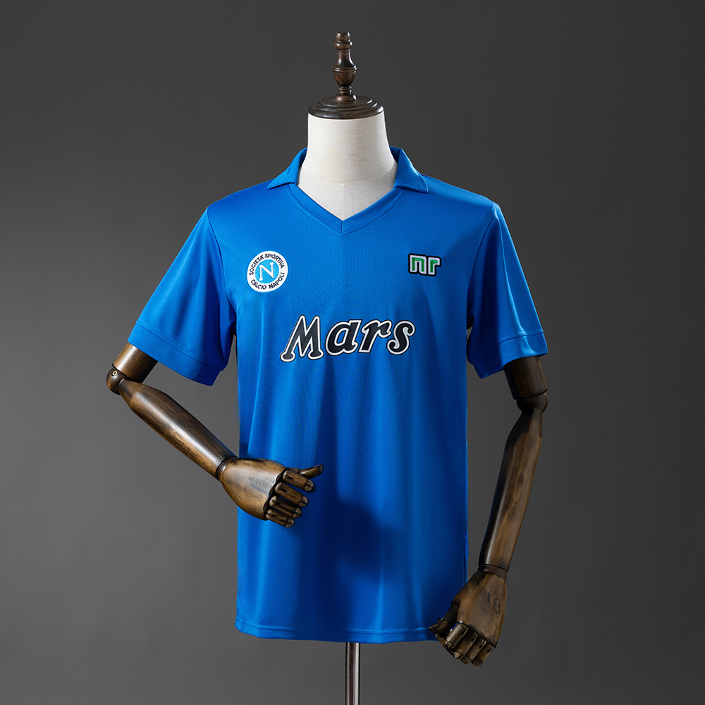 Mens Napoli Retro Home Jersey 1989/90 Mens Napoli Retro Home Jersey 1989/90 on mannequin showing azure blue base and Mars sponsor