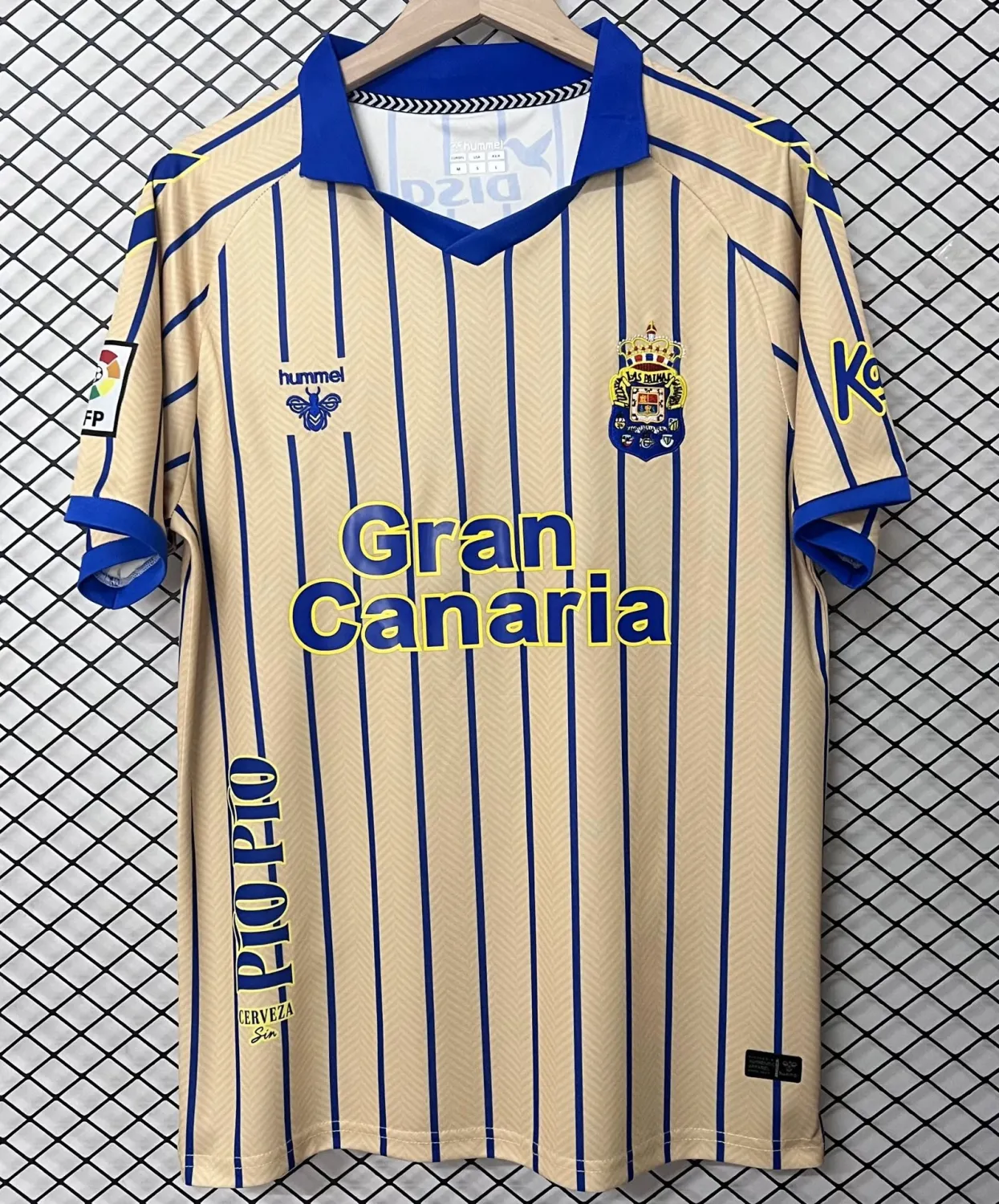 Mens Las Palmas Retro Jersey 2026/27 Mens Las Palmas Retro Jersey 2026/27 sand and blue pinstripe shirt front view with crest