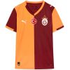 Mens Galatasaray Home Jersey 2025/26 on hanger showing orange and maroon halved design with Turkish flag roundel