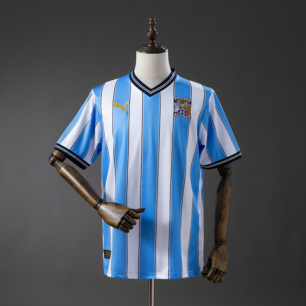 Mens Coventry City 25th Edition Retro Anniversary Home Jersey 2011/12 Mens Coventry City 25th Edition Retro Anniversary Home Jersey 2011/12 front view with sky blue stripes and navy collar