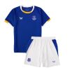 Kids Everton Home Kit 2026/27 front view with royal blue shirt, Castore logo, club crest, and white shorts