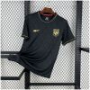 Mens Panama Third Jersey 2025 on hanger showing black jacquard pattern and metallic gold crest