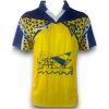 Bright yellow jersey with navy yoke, zigzag print and crowned crest, front view