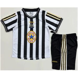 Kids Newcastle United Retro Home Kit 1997/99 jersey and shorts set flat lay view