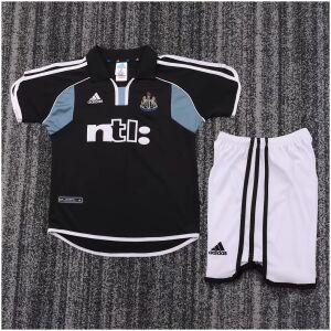 Kids Newcastle United Retro Away Kit 2000/01 jersey and shorts set flat lay view
