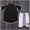 Kids Newcastle United Retro Away Kit 2000/01 Kids Newcastle United Retro Away Kit 2000/01 rear view of shirt and shorts