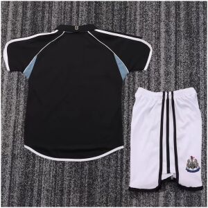 Kids Newcastle United Retro Away Kit 2000/01 rear view of shirt and shorts