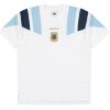 Mens Argentina Equipment Tee Jersey 2026 front view in white with retro shoulder blocking and gold crest