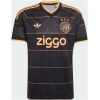 Mens Ajax Away Jersey 2026/27 black shirt front view with metallic copper trim and three-star crest