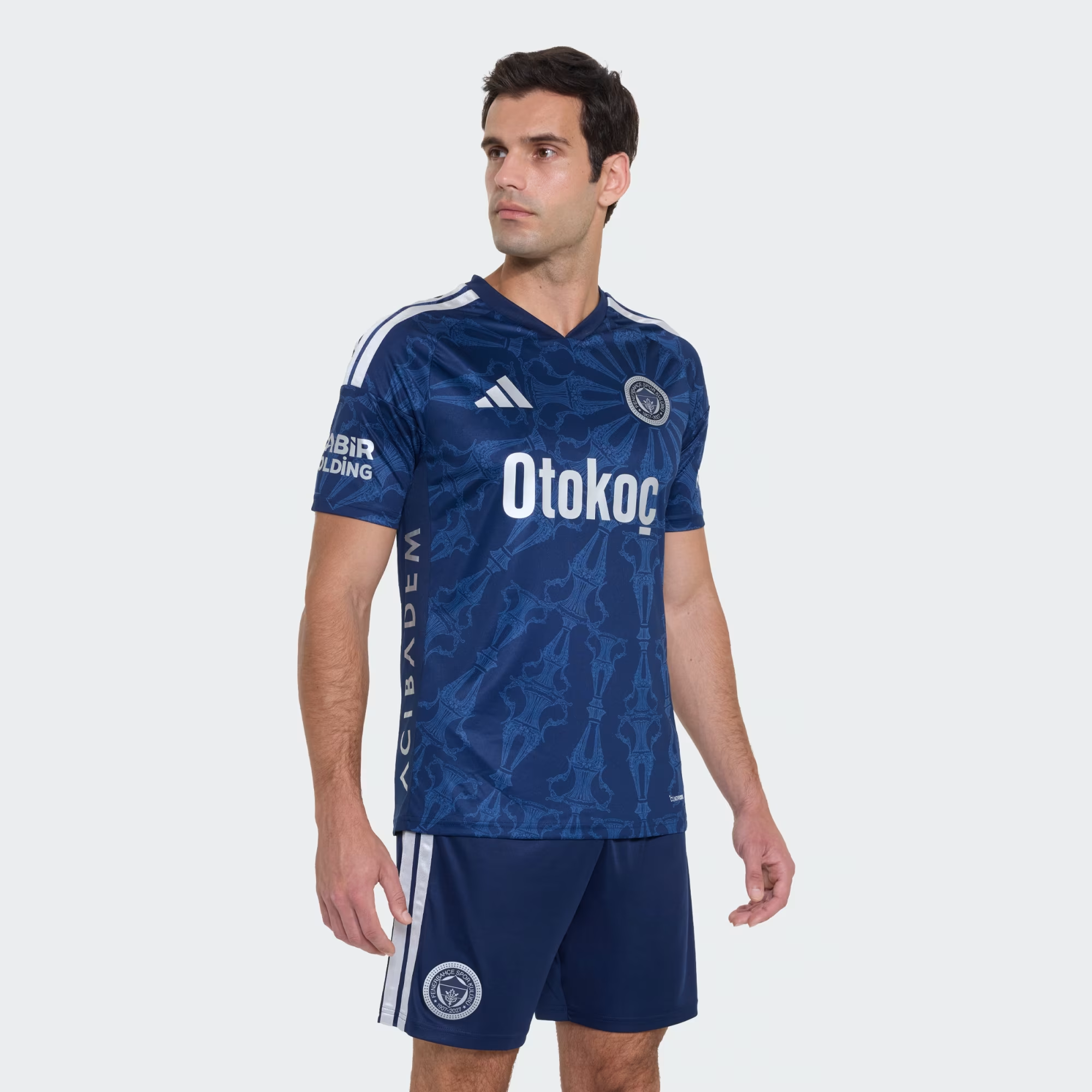 Mens Fenerbahce Third Jersey 2026/27 Mens Fenerbahce Third Jersey 2026/27 navy shirt front view with trophy artwork and white Otokoç sponsor