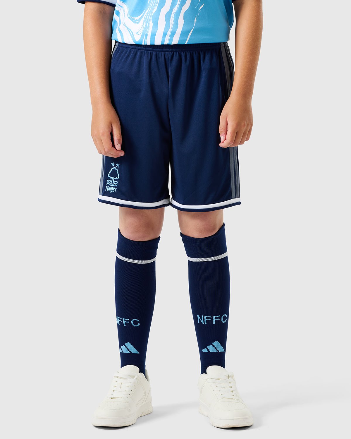 Kids Nottingham Forest Third Shorts 2026/27 Kids Nottingham Forest navy third shorts front view with light blue side stripes