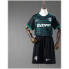 Kids Sporting CP Christmas Special Edition Kit 2025/26 front view with matching shorts