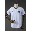 Mens Iraq Home Jersey 2026 front view in white with tonal geometric pattern and tricolor trim