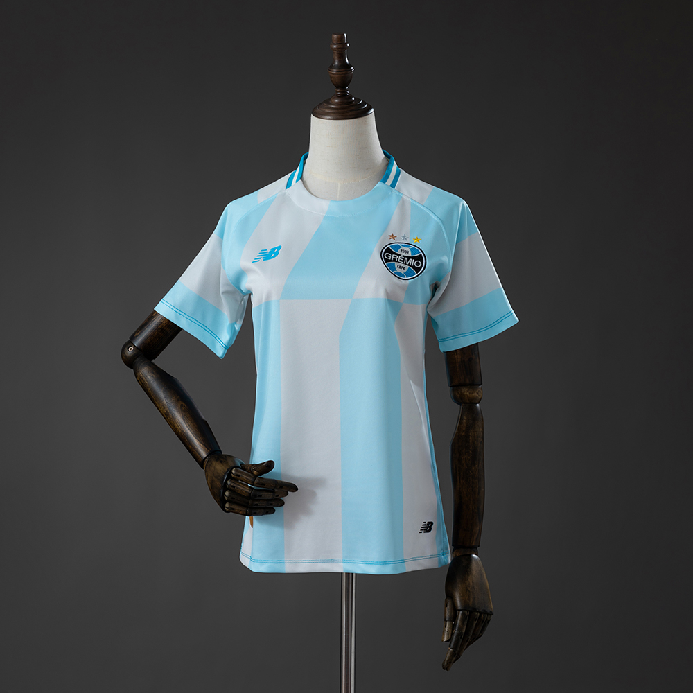 Womens Gremio Away Jersey 2026/27 Womens Gremio Away Jersey 2026/27 front view with sky blue and white geometric pattern and Gremio crest