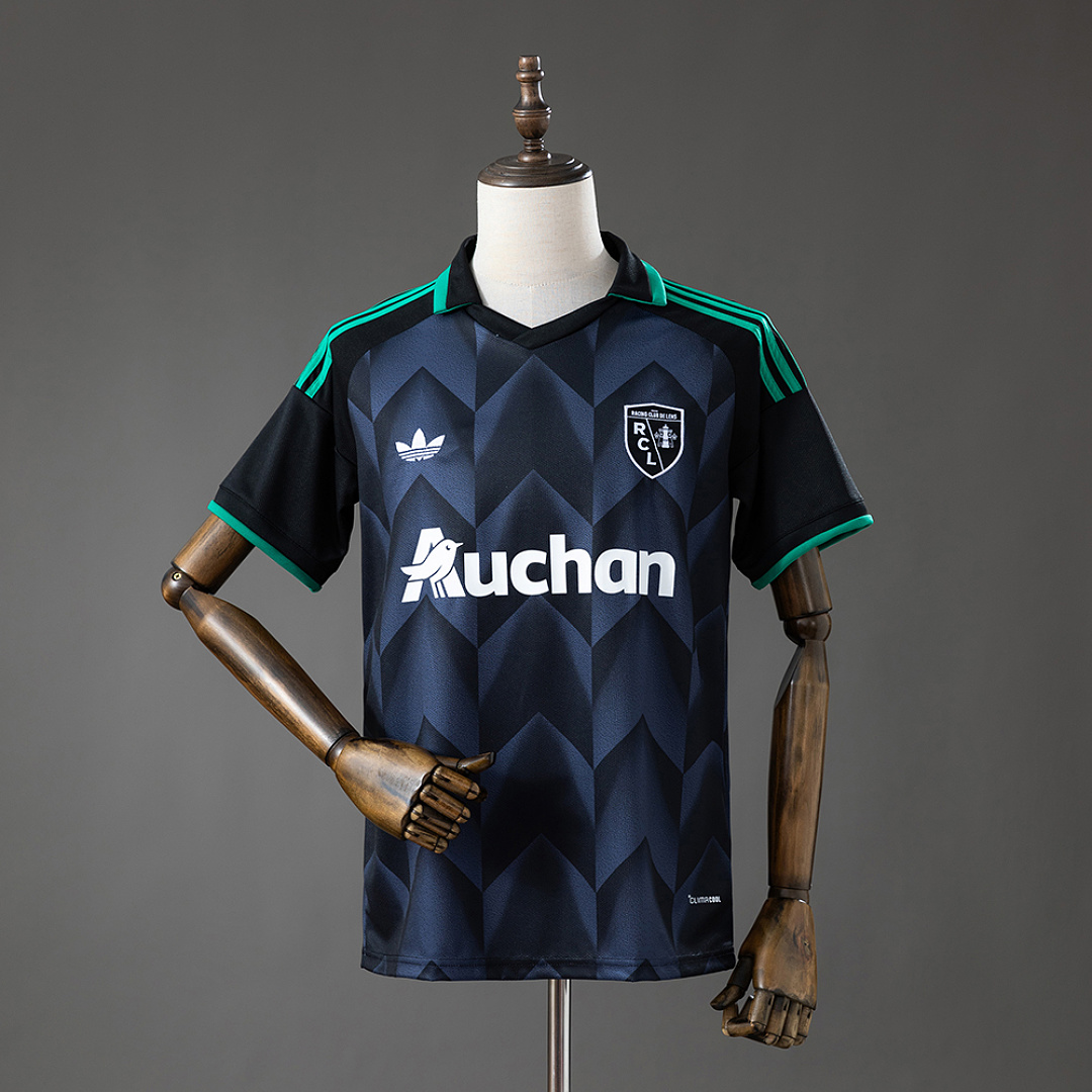 Mens RC Lens Away Jersey 2026/27 Mens RC Lens Away Jersey 2026/27 front view in dark navy with chevron pattern and green trim