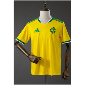 Mens Internacional Brazil Edition Jersey 2026/27 Mens Internacional Brazil Edition Jersey 2026/27 front view in yellow with green trim and SCI crest