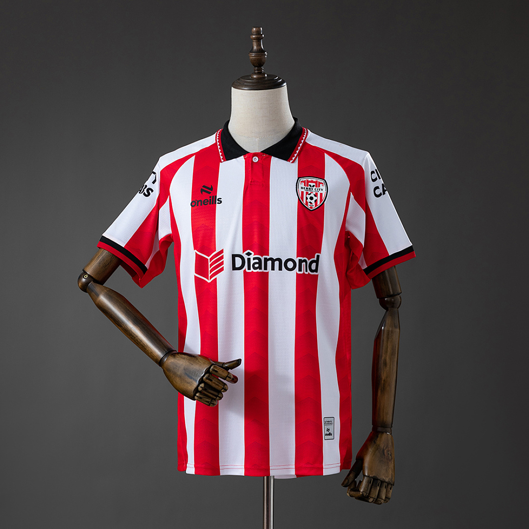 Mens Derry City Home Jersey 2026/27 Mens Derry City Home Jersey 2026/27 front view in red and white stripes with polo collar