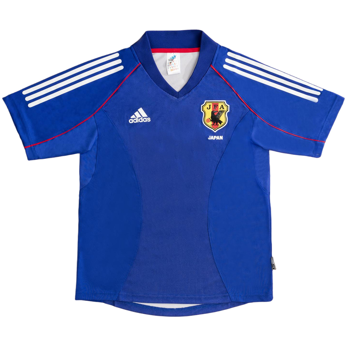Mens Japan Retro Home Jersey 2002 Mens Japan Retro Home Jersey 2002 front view in Samurai Blue with red piping and JFA crest