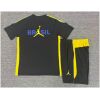 Kids Brazil Jordan Collaboration Black/Yellow Training Kit 2026 Kids Brazil Jordan Collaboration Black/Yellow Training Kit Kit 2026 rear view of shirt and shorts