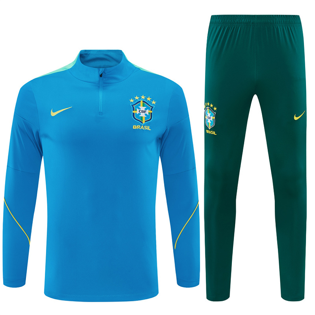 Mens Brazil Half-zip Light Blue Training Kit Suit 2026 Mens Brazil Half-zip Light Blue Training Kit Suit 2026 light blue top and dark green pants front view