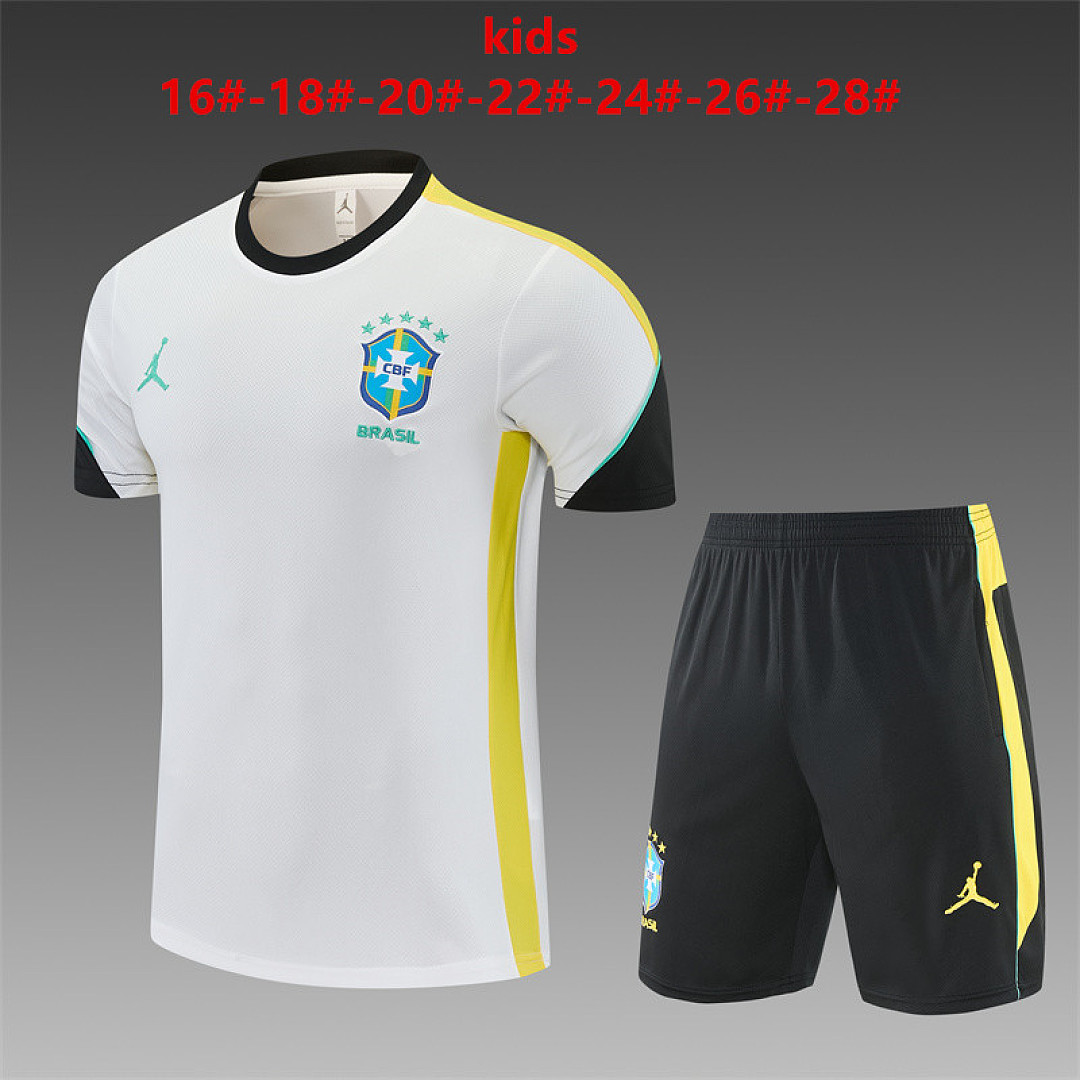 Kids Brazil Jordan Collaboration White Training Kit 2026 Kids Brazil Jordan Collaboration White Training Kit Kit 2026 white shirt and black shorts front view