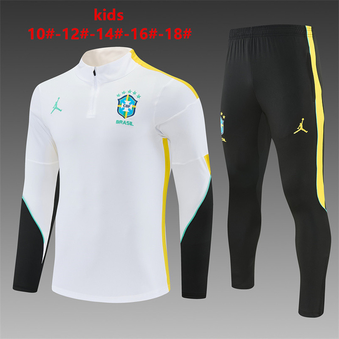 Kids Brazil Jordan Collaboration Half-zip White Training Kit Suit 2026 Kids Brazil Jordan Collaboration Half-zip White Training Kit Suit 2026 white top and black pants front view