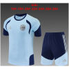 Kids Ajax Light Blue Training Kit Kit 2026/27 light blue shirt and navy shorts front view