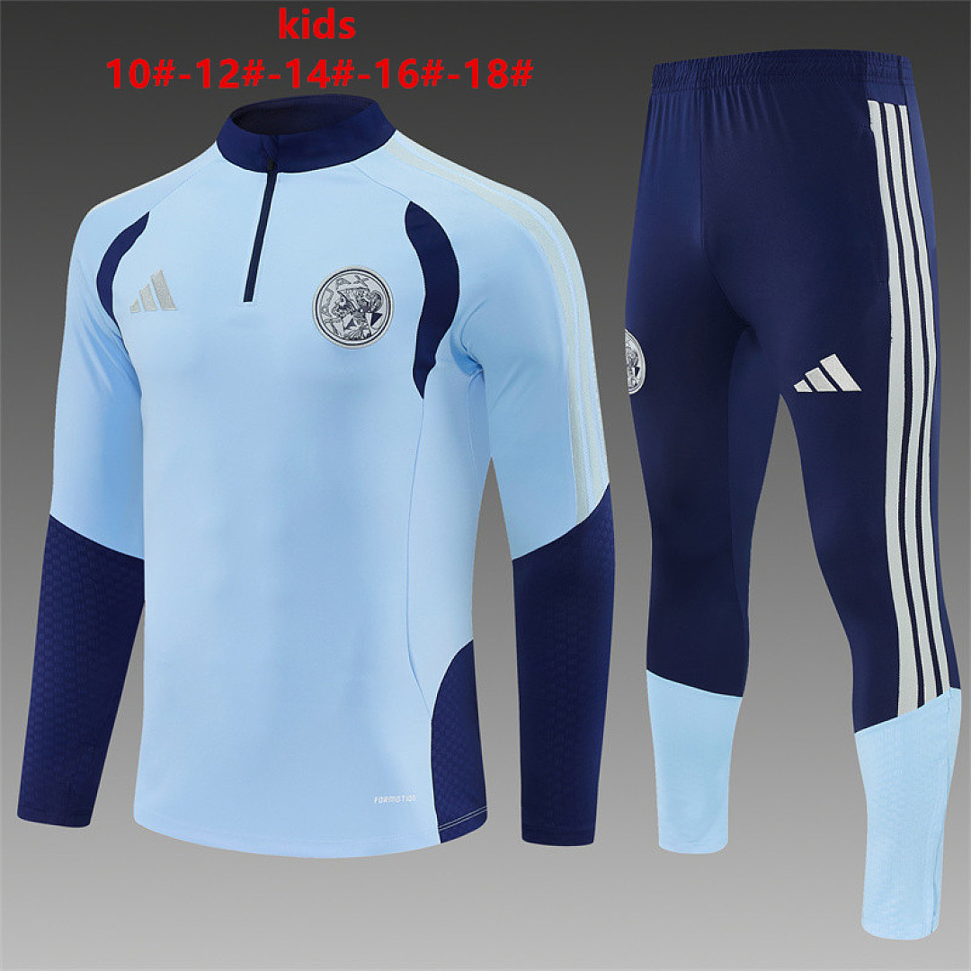 Kids Ajax Half-zip Light Blue Training Kit Suit 2026/27 Kids Ajax Half-zip Light Blue Training Kit Suit 2026/27 light blue top and navy pants front view