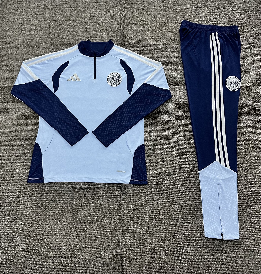 Kids Ajax Half-zip Light Blue Training Kit Suit 2026/27 Kids Ajax Half-zip Light Blue Training Kit Suit 2026/27 rear view of shirt and shorts