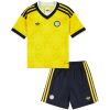 Kids Leeds United Away Kit 2026/27 yellow shirt and navy shorts front view with Yorkshire Rose pattern