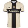 Mens Parma Calcio 1913 Home Jersey 2026/27 cream shirt front view featuring black cross and Prometeon sponsor